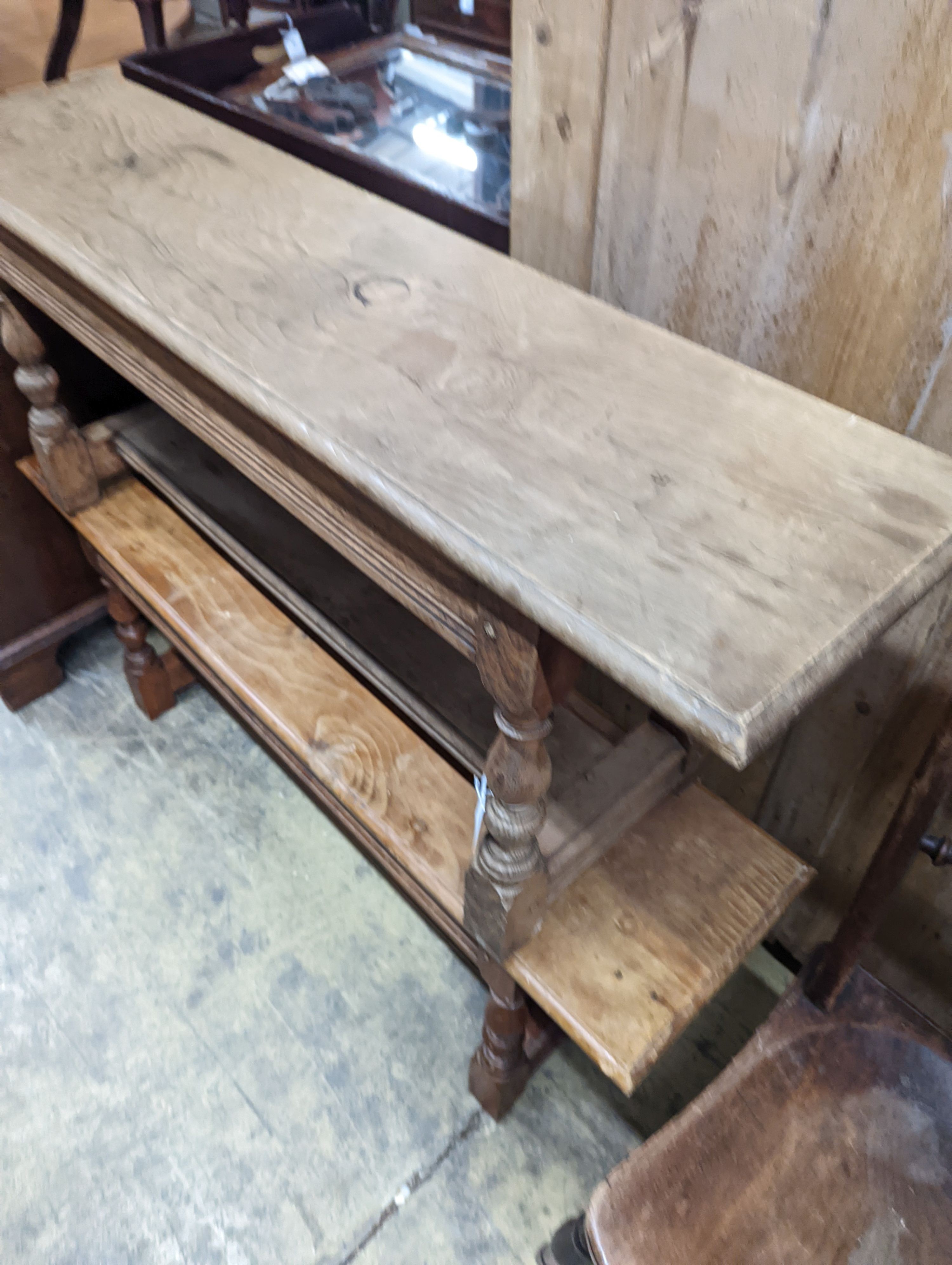 A pair of 18th century style oak benches, length 124cm, depth 30cm, height 48cm